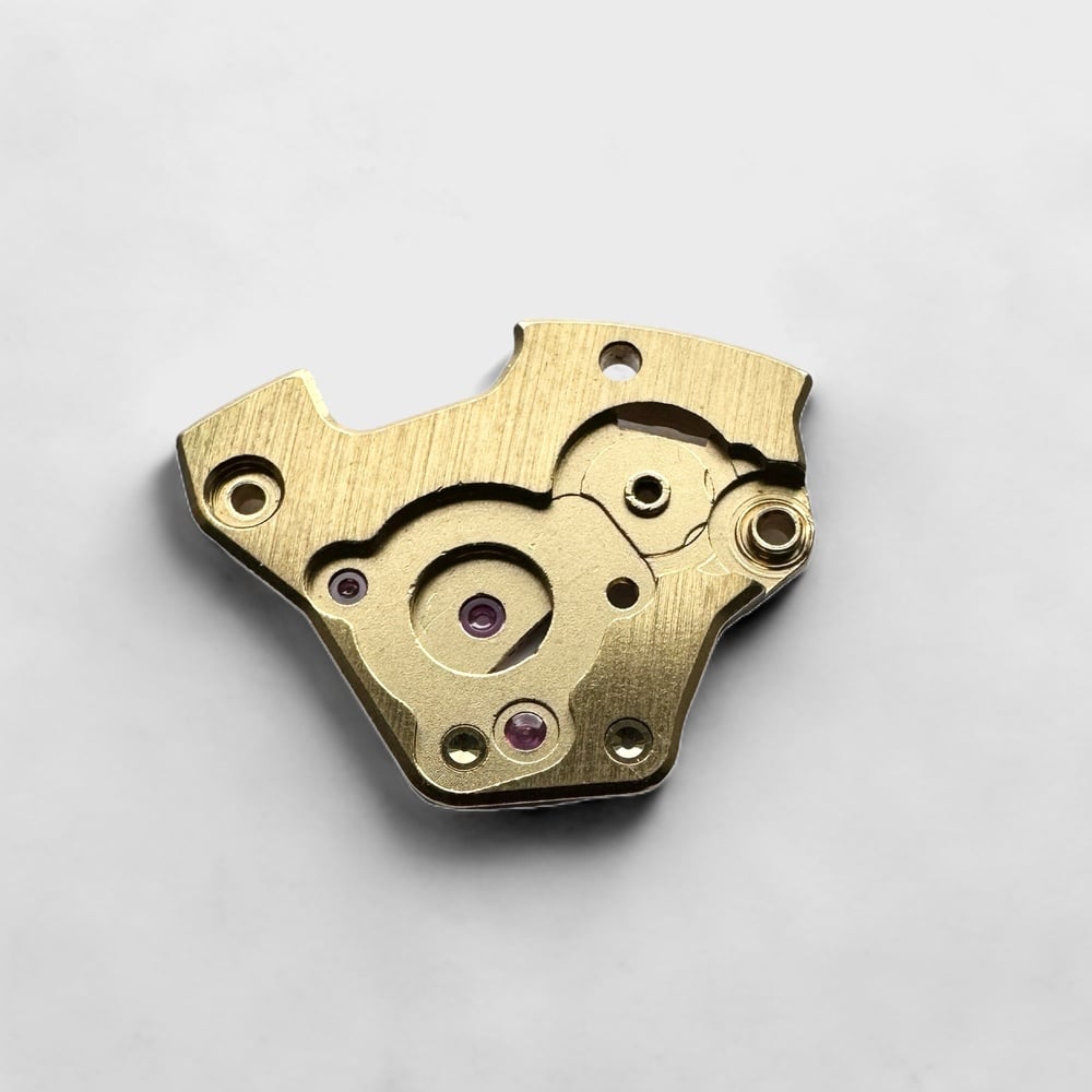 Back of Genuine original vintage train wheel bridge from BUREN for caliber 12/14/15 referenced with nomenclature 110