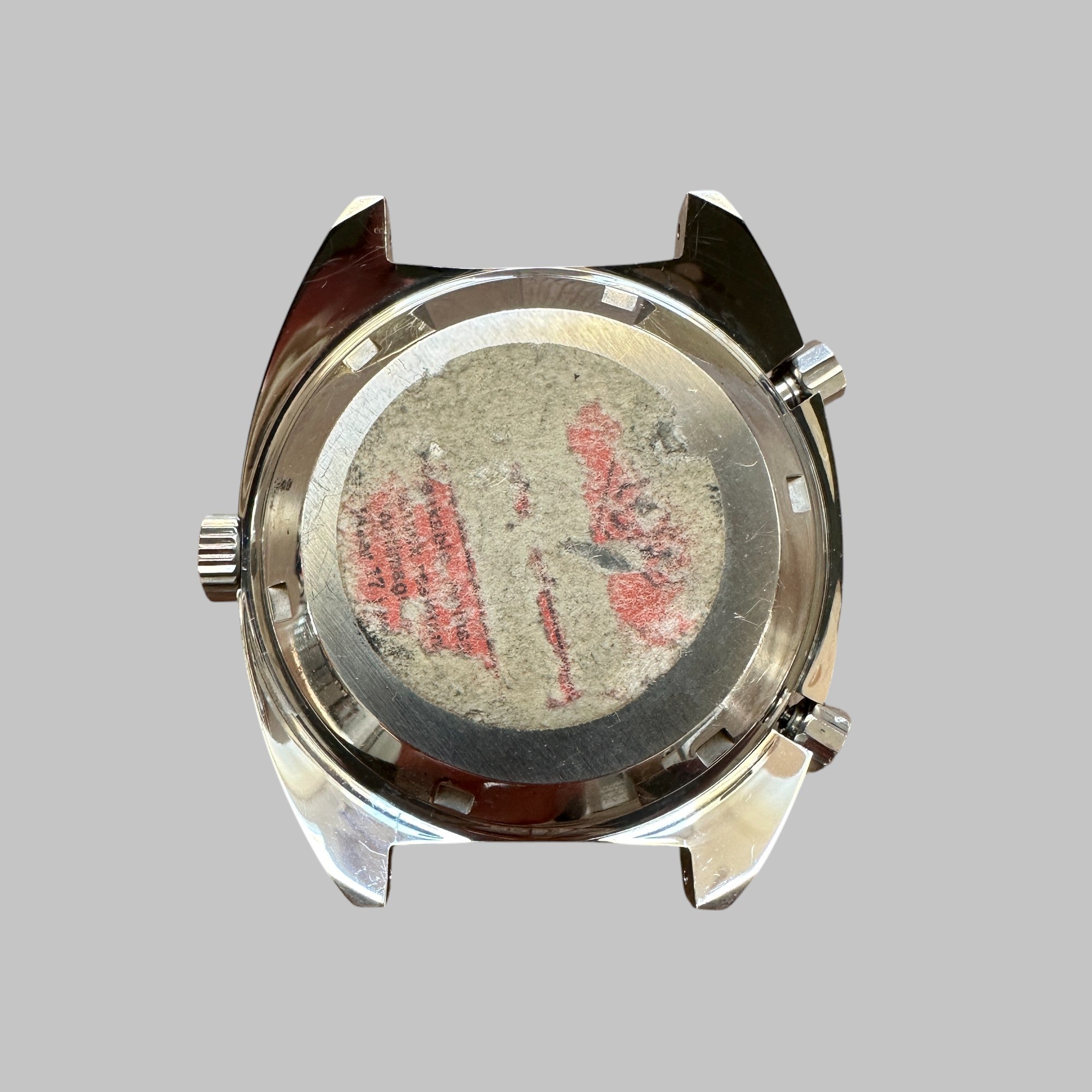 Back of Genuine original vintage case tachy from HEUER for caliber 12 of the model 1163V of line AUTAVIA