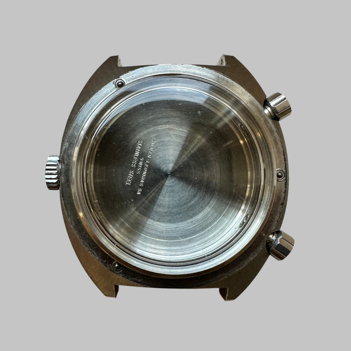 Genuine original vintage case tachy from Heuer for caliber 12 of the model 1163V of line AUTAVIA - side view