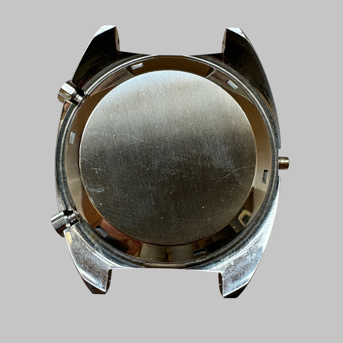 Genuine original vintage case tachy from Heuer for caliber 12 of the model 1163V of line AUTAVIA - side view