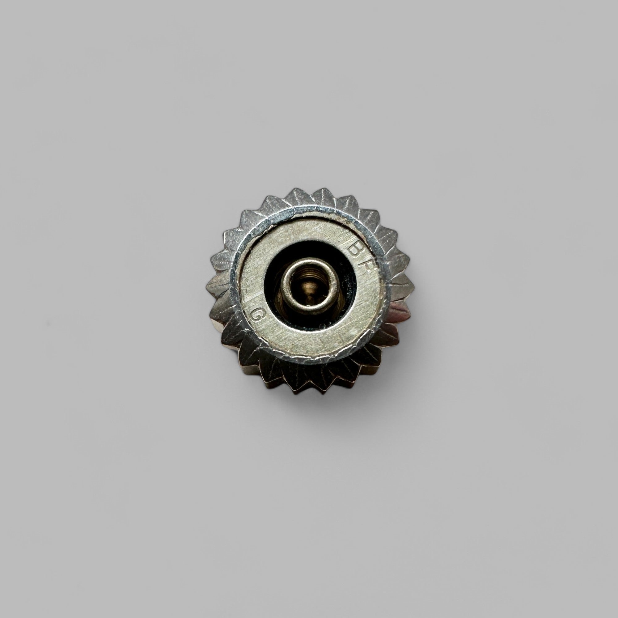 Back of Genuine original vintage crown from HEUER of the model 1133 of line MONACO