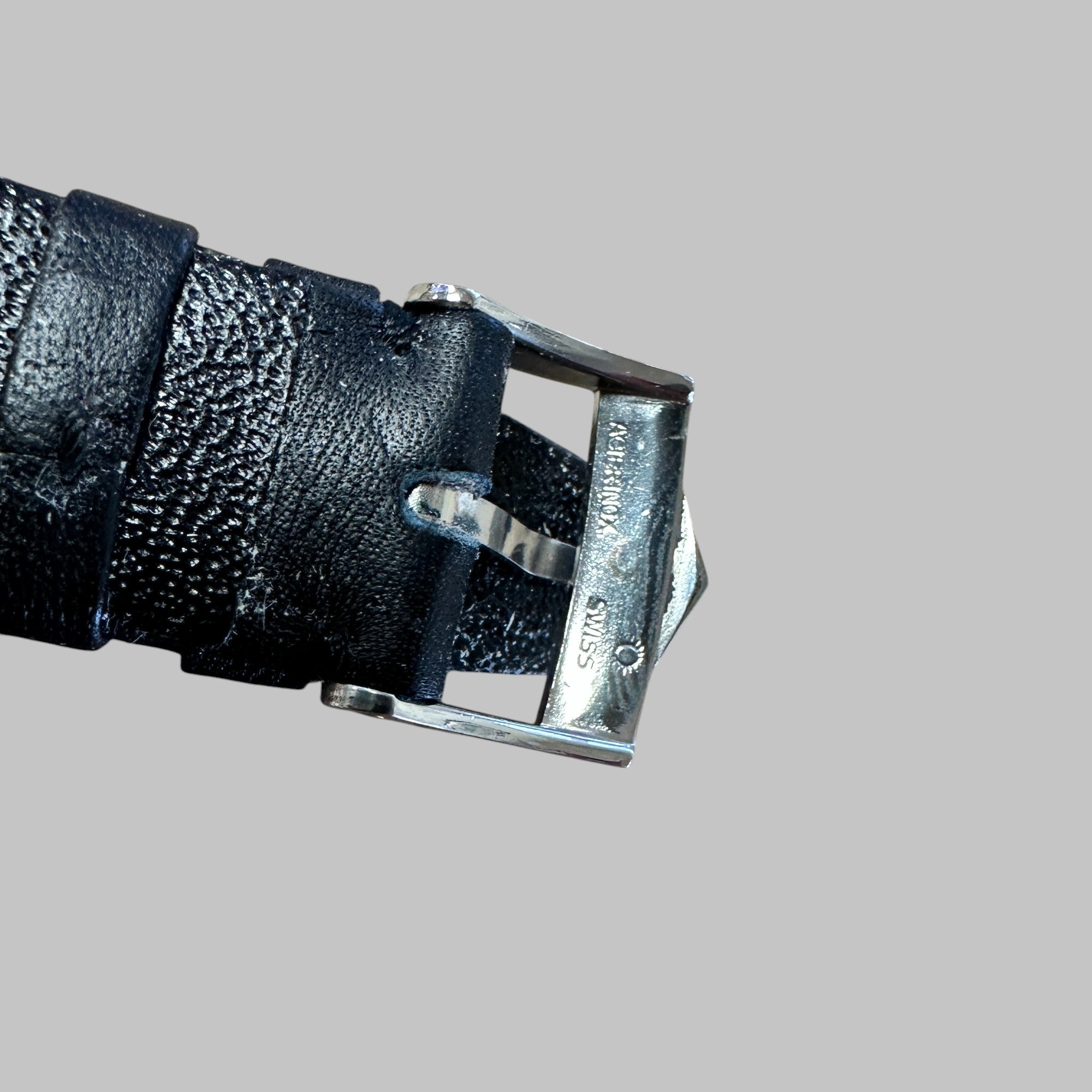 Back of Genuine original vintage black leather strap from HEUER of line CORFAM