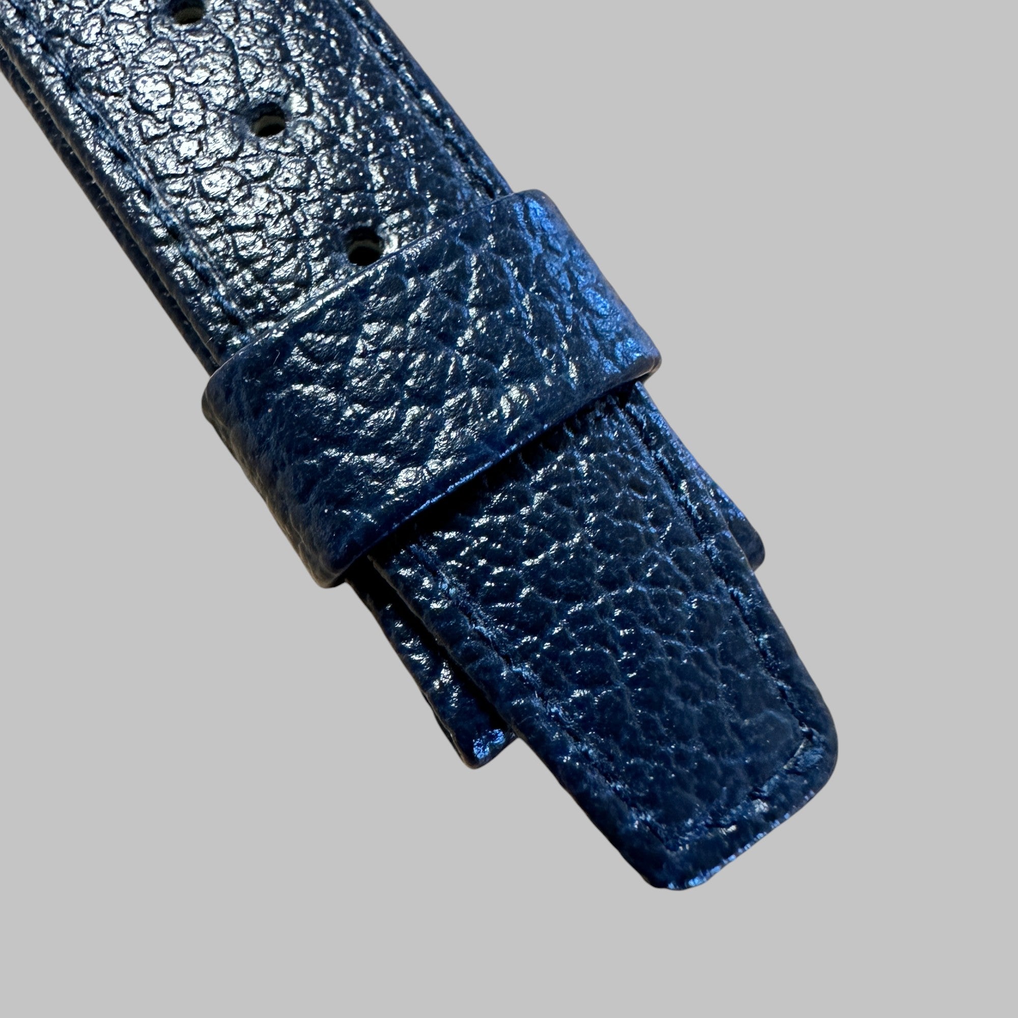 Back of Genuine original vintage blue leather strap from HEUER of line RACING
