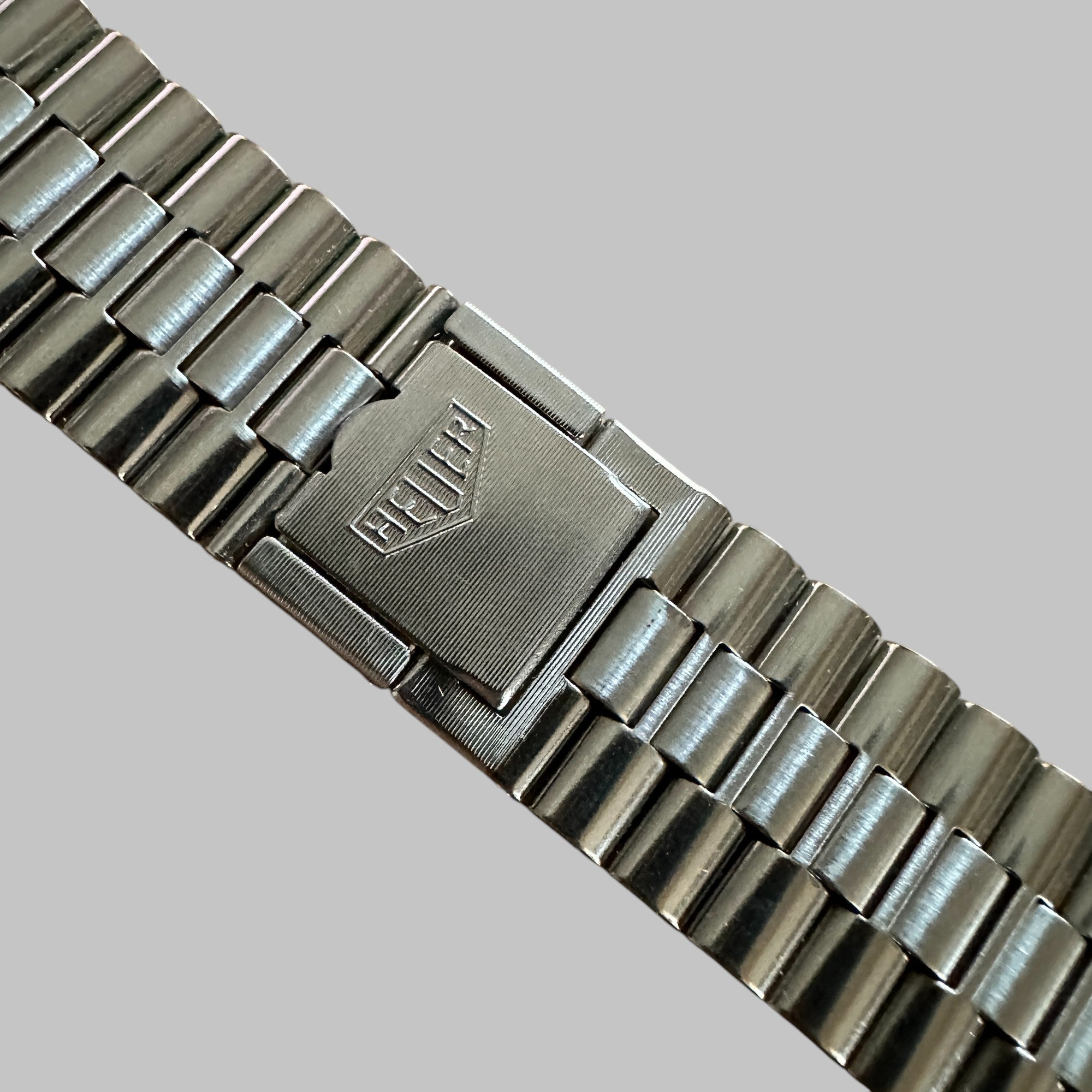 Back of Genuine original vintage steel bracelet from HEUER of the model SILVERSTONE 110.313 of line SILVERSTONE