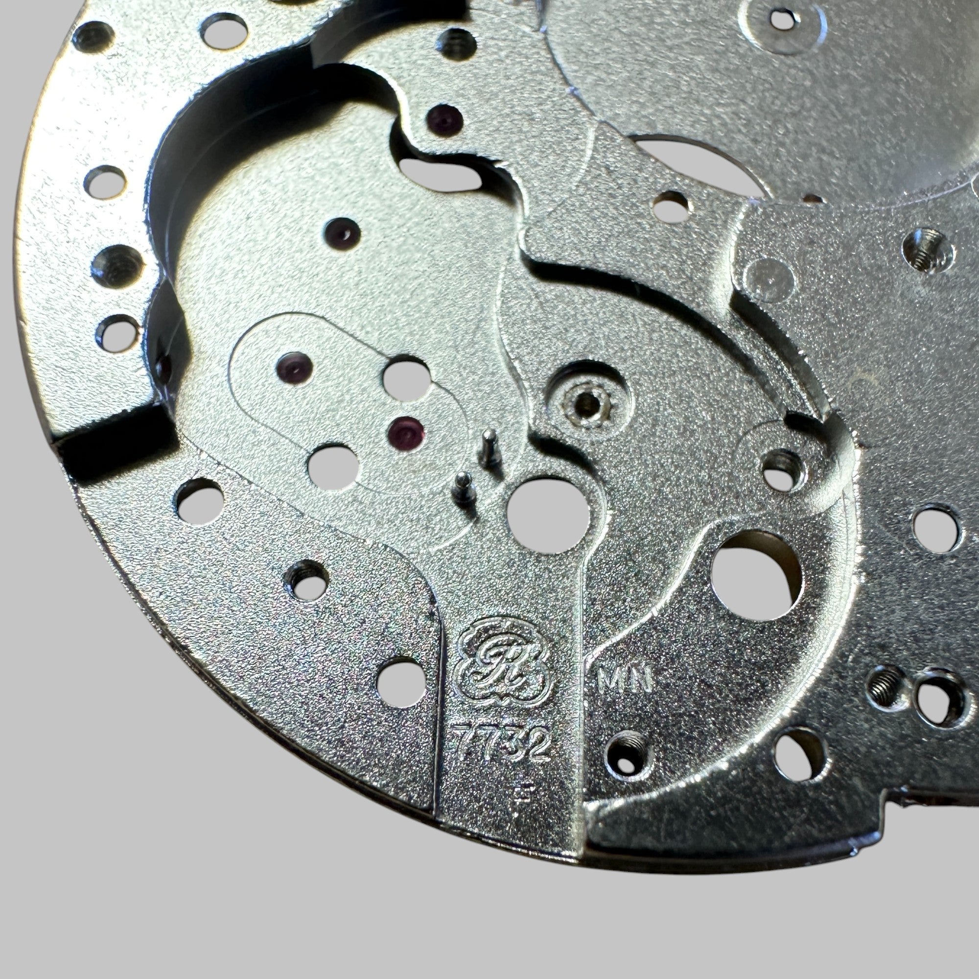 Back of Genuine original vintage mainplate jewelled from HEUER for caliber 7732