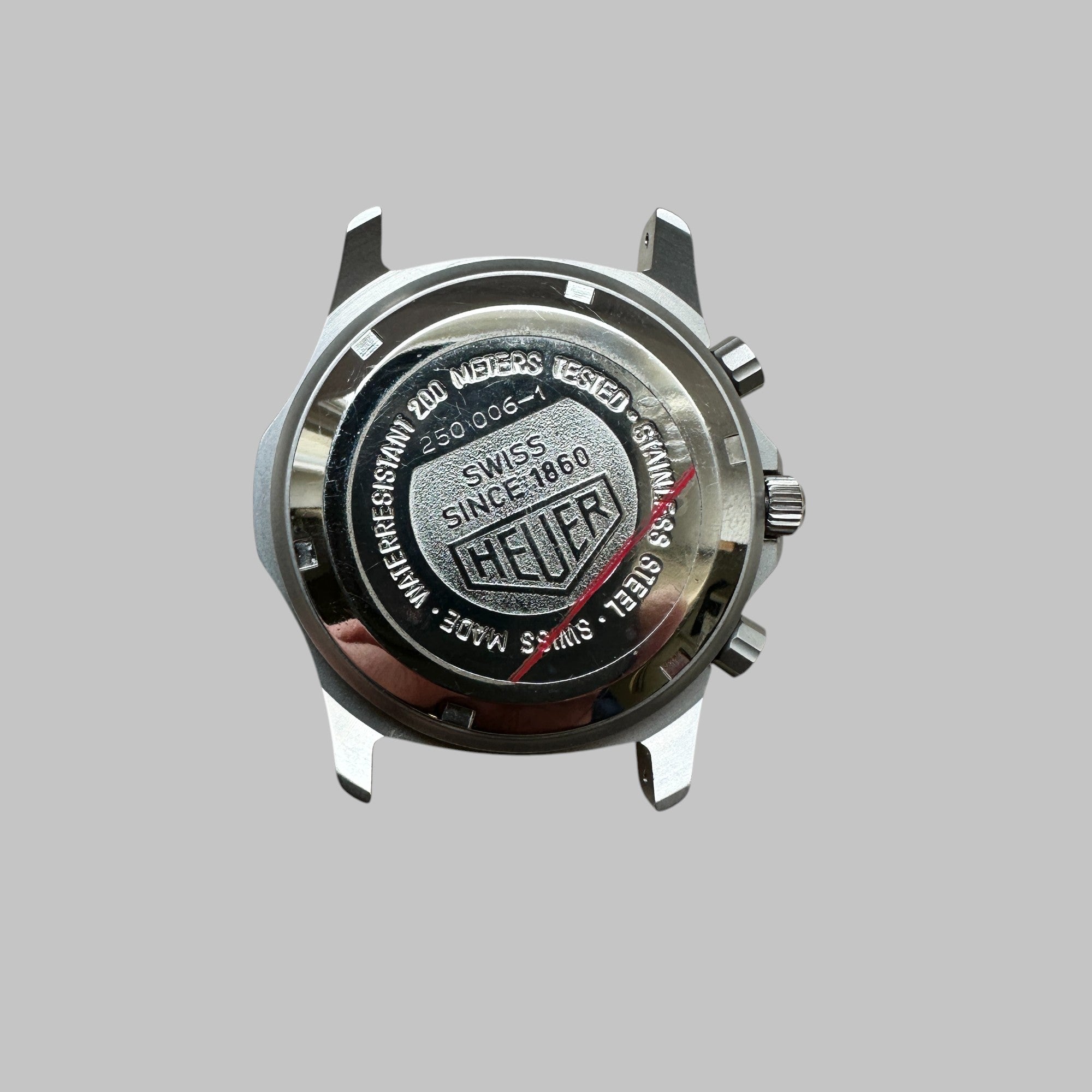 Back of Genuine original vintage case from HEUER for caliber QUARTZ of the model REFERENCE 250.006-1