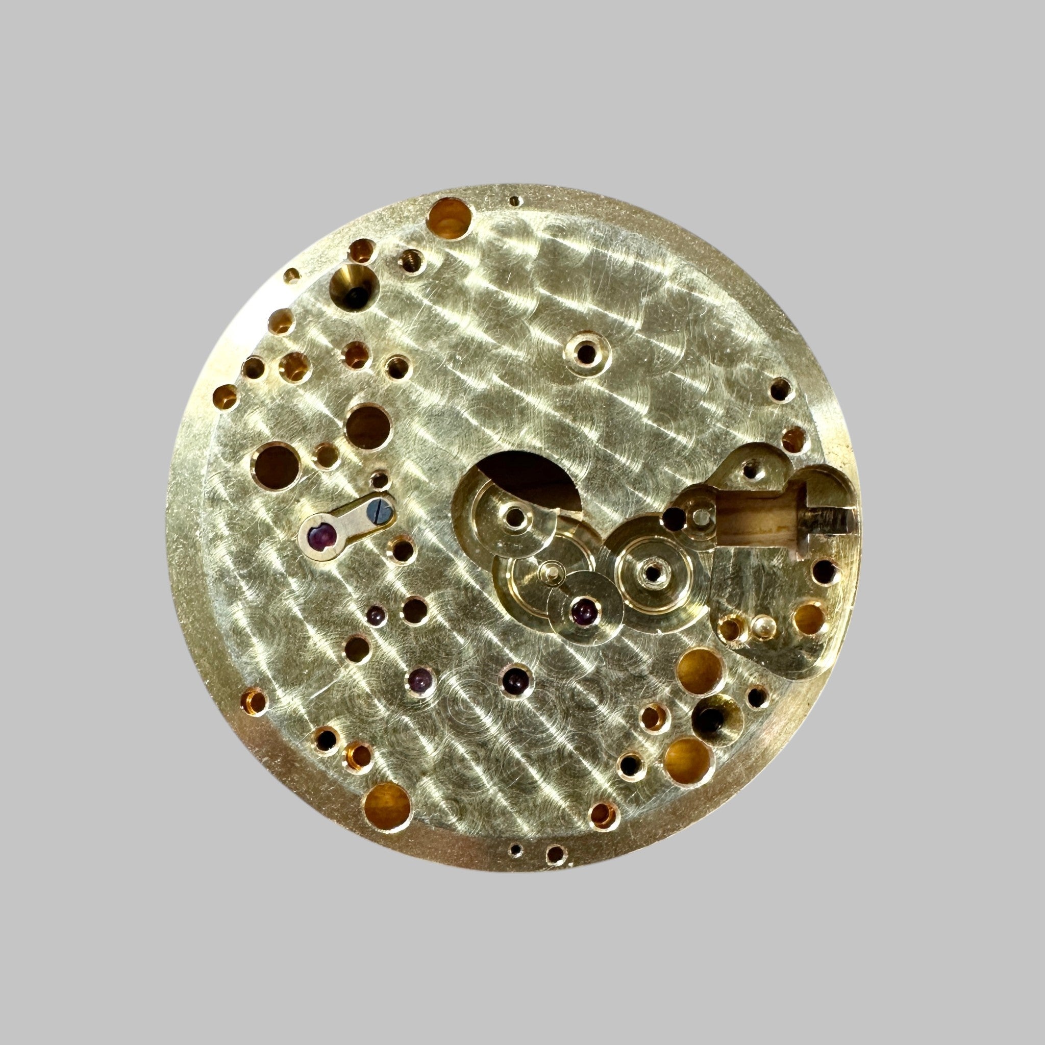 Genuine original vintage mainplate with incabloc from Jaeger-LeCoultre for caliber 450/4C referenced with nomenclature 100 - side view