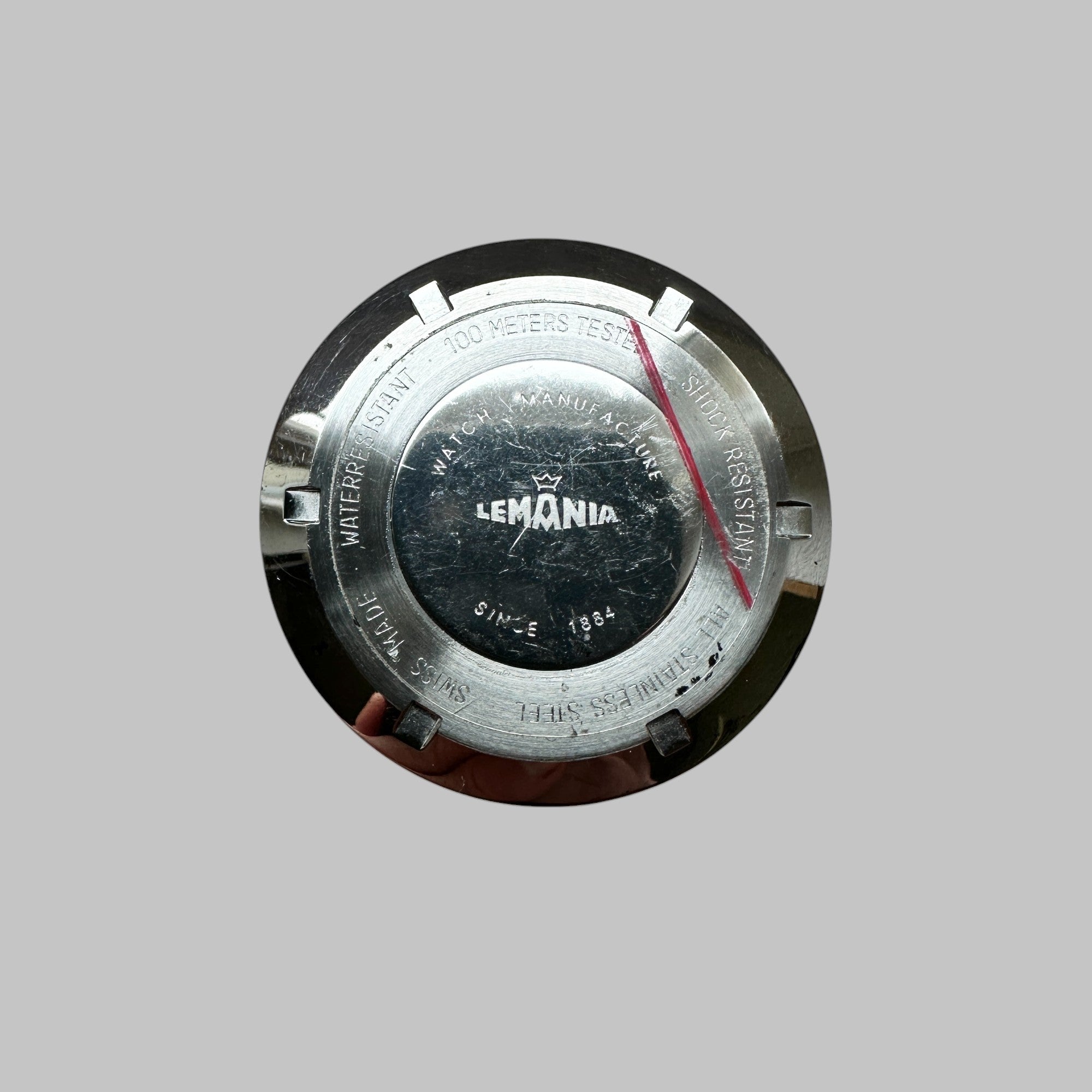 Genuine original vintage caseback from LEMANIA of the model REFERENCE 9856