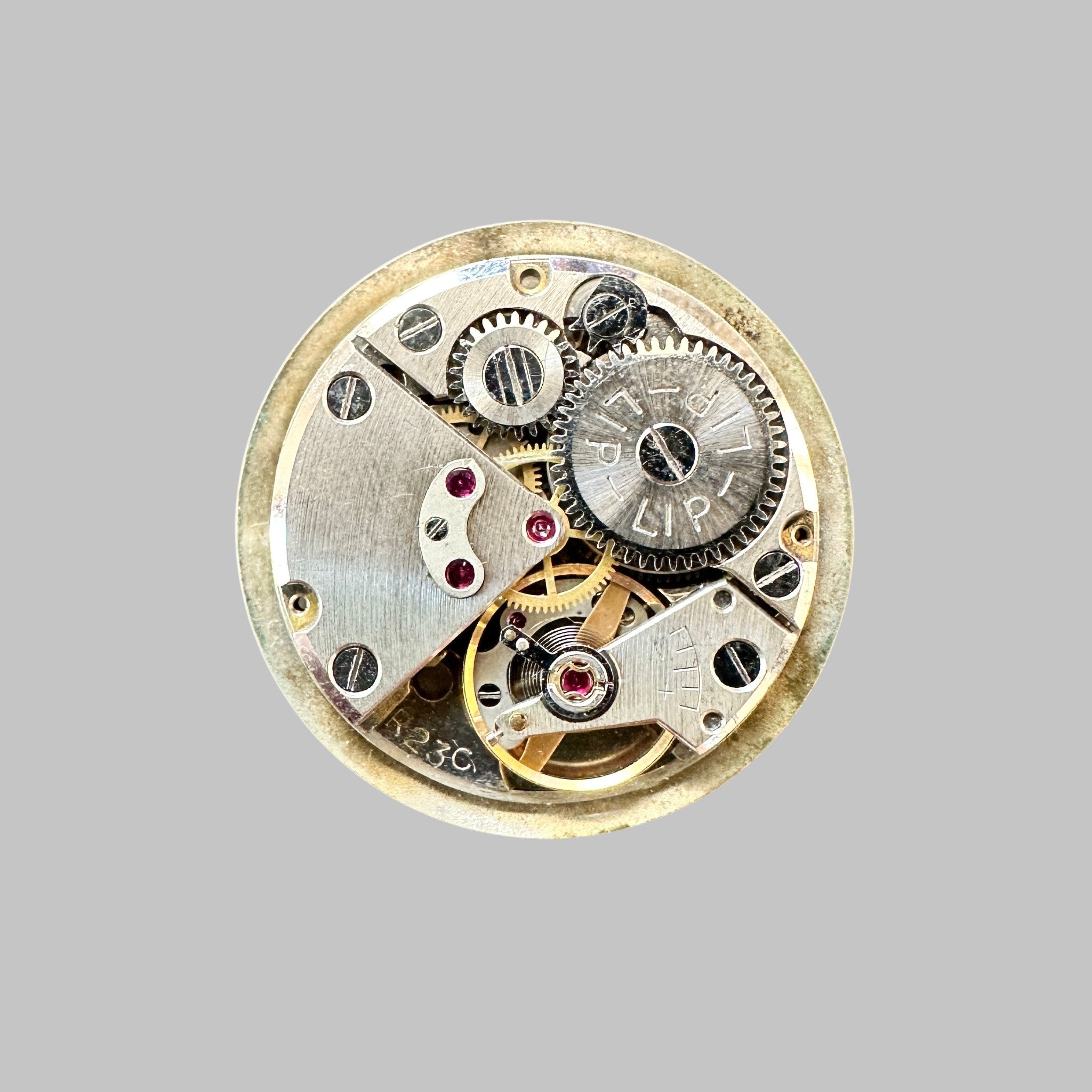 Genuine original vintage complete movement from Lip for caliber R23C - side view