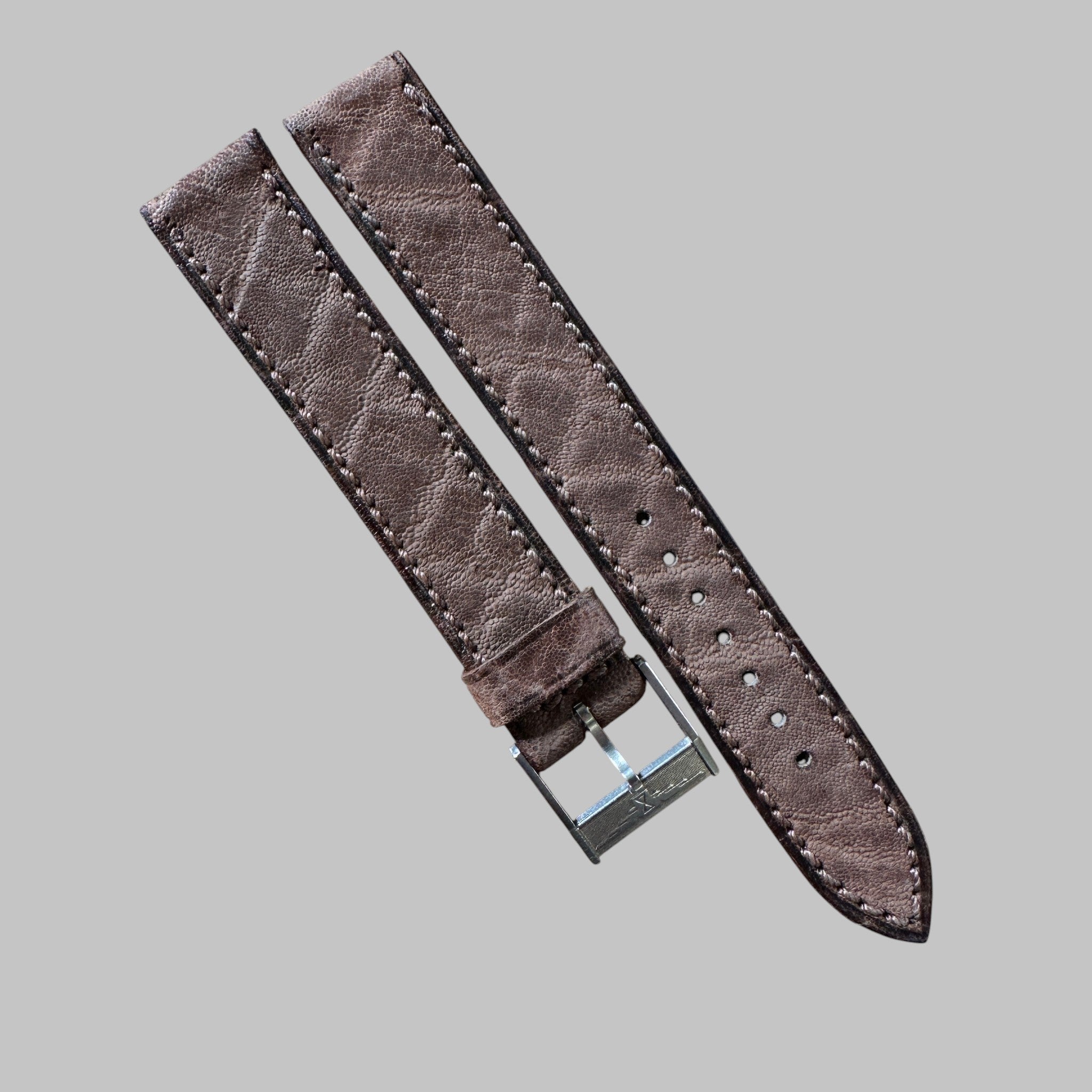 Genuine original vintage leather strap with steel buckle from Longines - side view