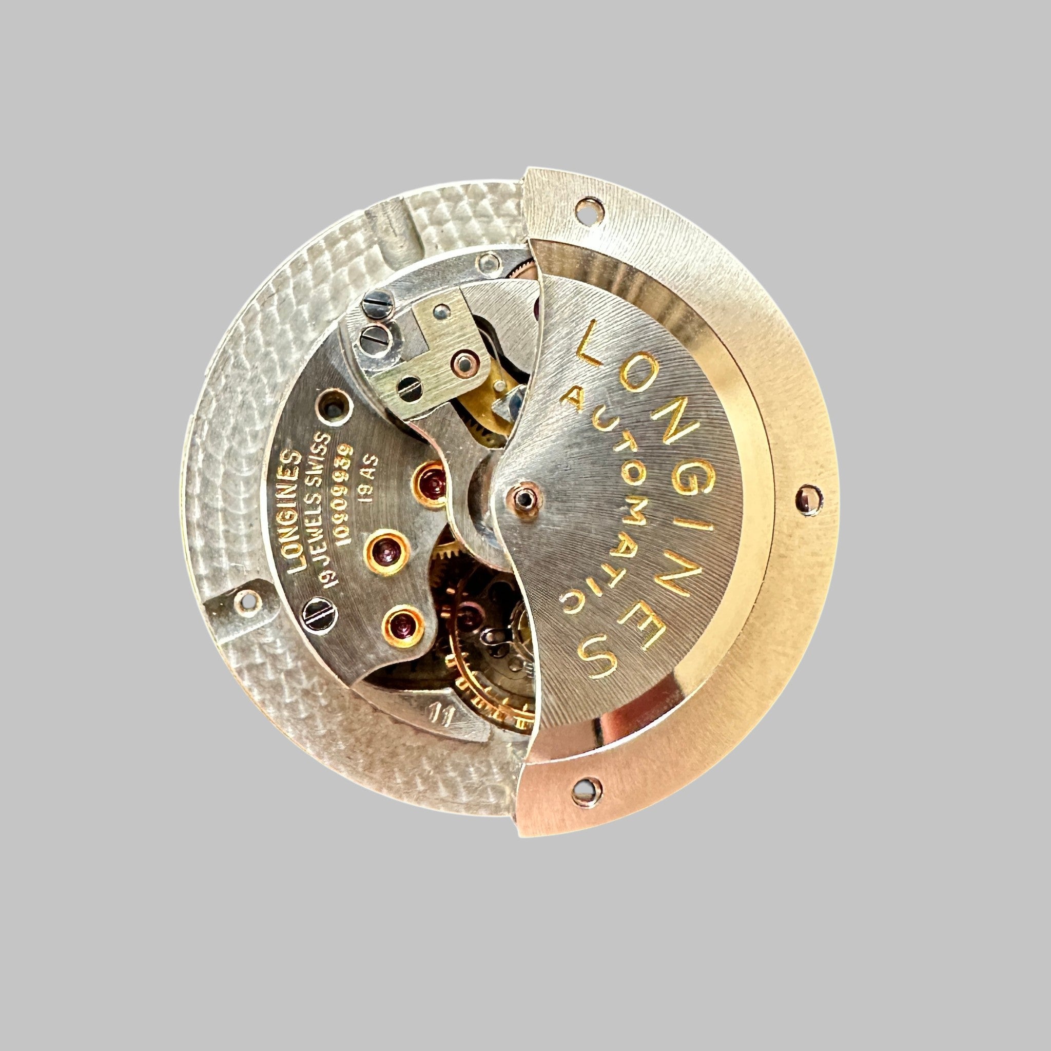 Genuine original vintage movement from Longines for caliber 19AS - side view