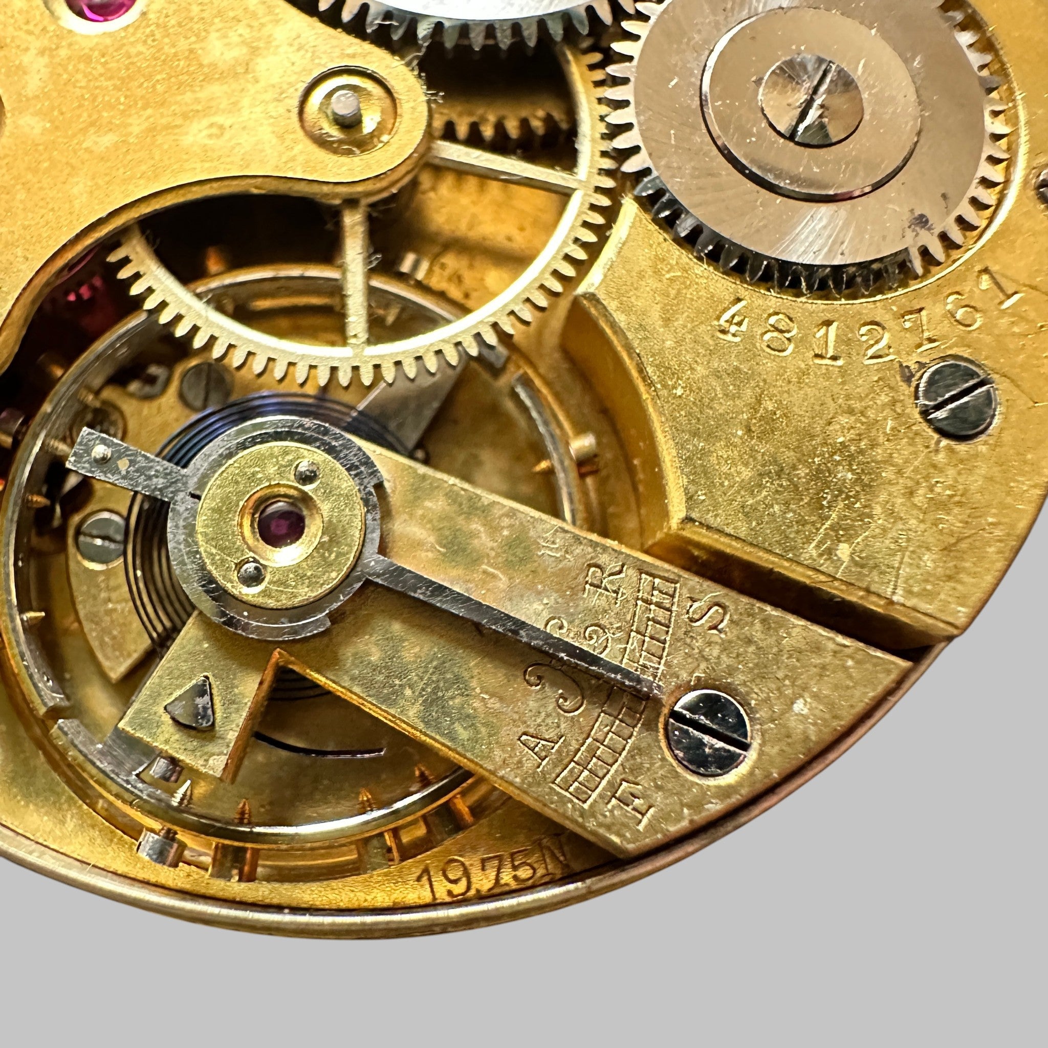 Genuine original vintage movement with dial from Longines for caliber 19.75N - side view