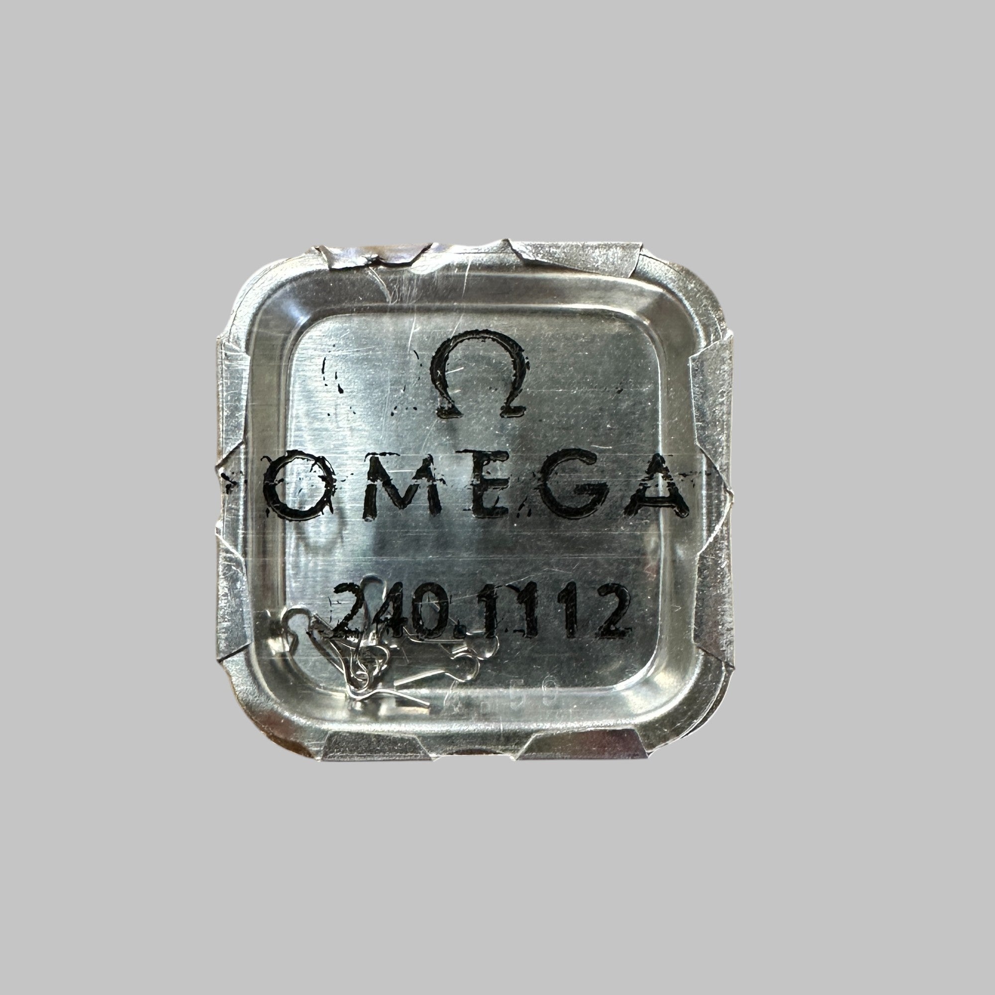 Genuine original vintage yoke spring from Omega for caliber 240 referenced with nomenclature 1112