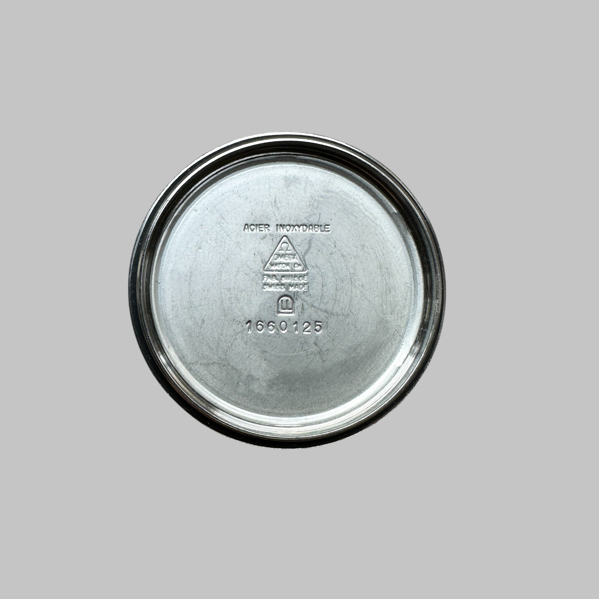 Back of Genuine original vintage caseback from OMEGA of the model REFERENCE 1660125