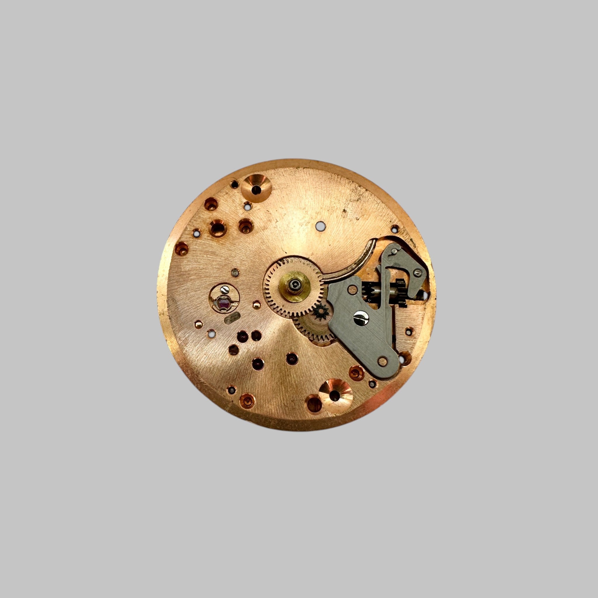 Genuine original vintage complete movement from Omega for caliber 283 - side view