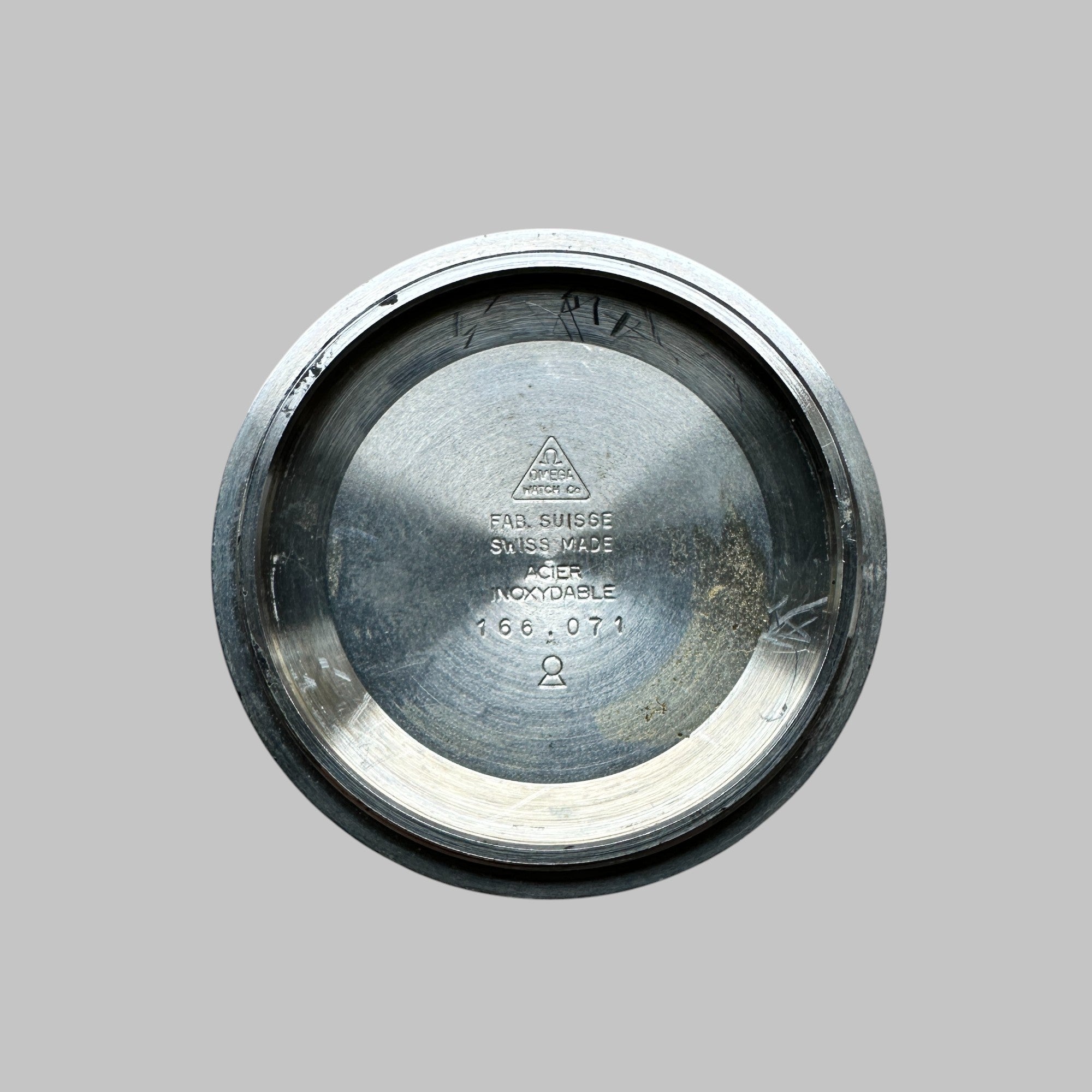 Back of Genuine original vintage caseback from OMEGA of the model REFERENCE 166.071