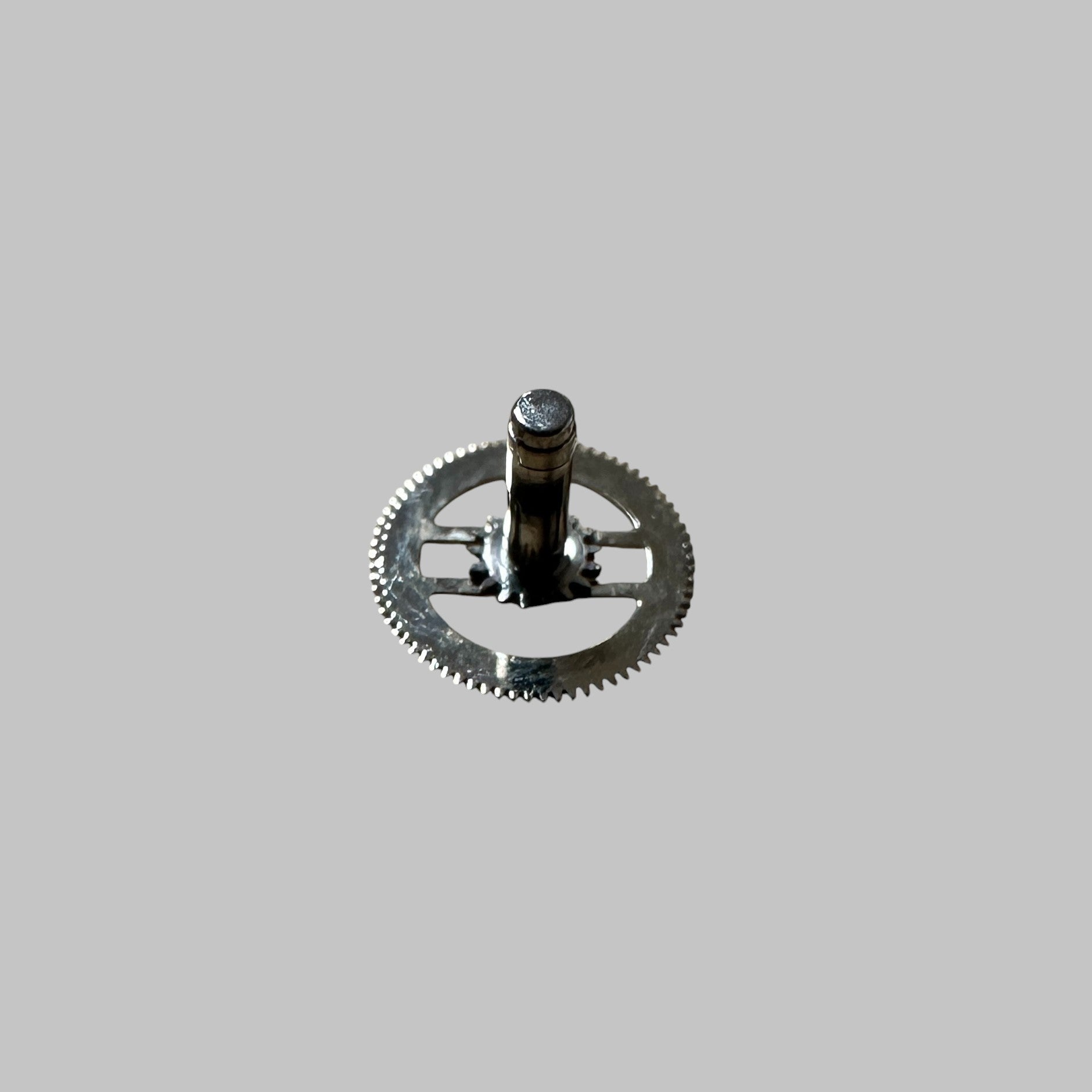 Genuine original vintage cannon pinion with driving wheel from Ulysse Nardin for caliber UN26 of the model BASE ETA 2892-2 referenced with nomenclature 242
