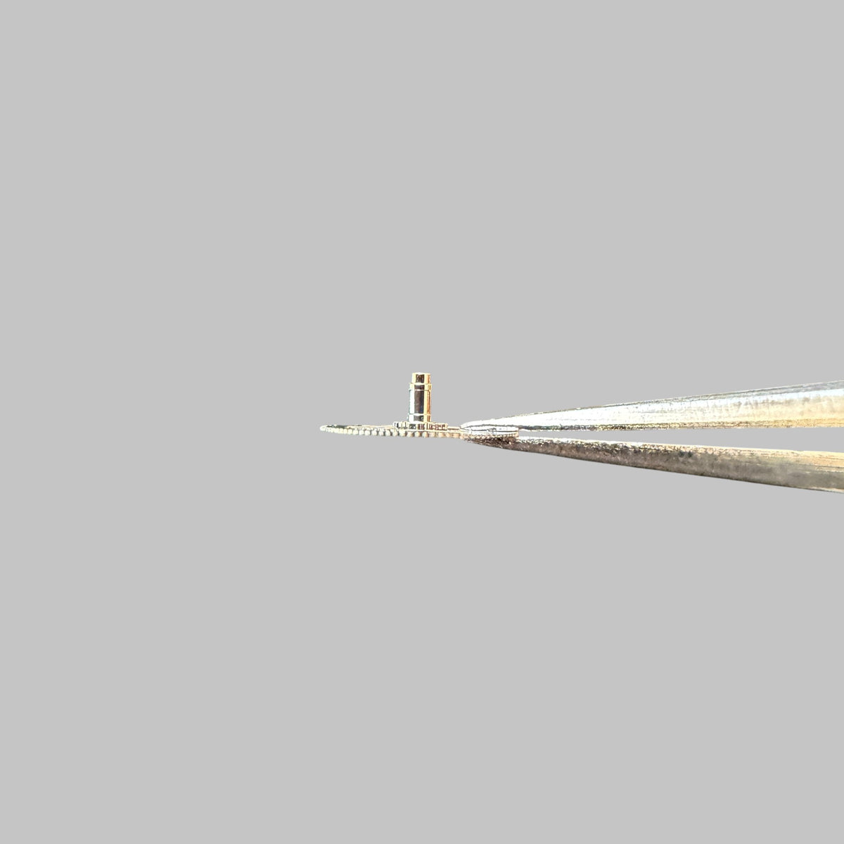 Genuine original vintage cannon pinion from Cartier for caliber 9611/9612MC of the model SQUELETTE of line SANTOS - side view
