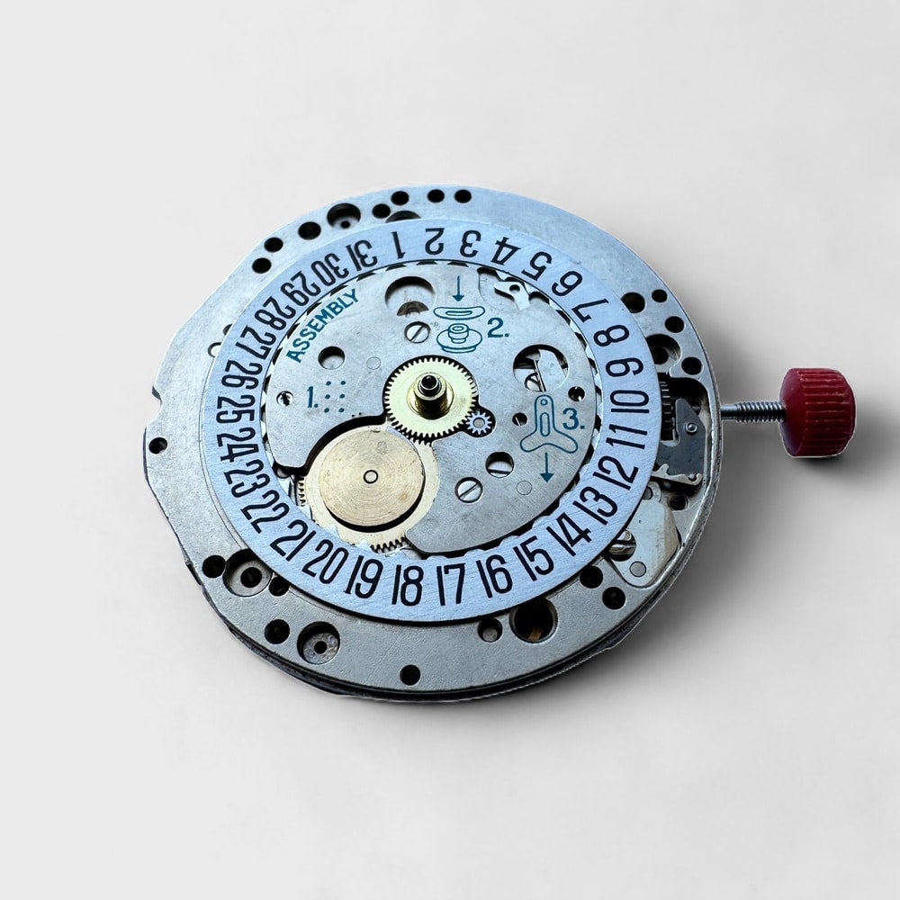 This is a picture of the BUREN CAL. 11 - AUTOMATIC MOVEMENT COMPLETE HEUER watch component.