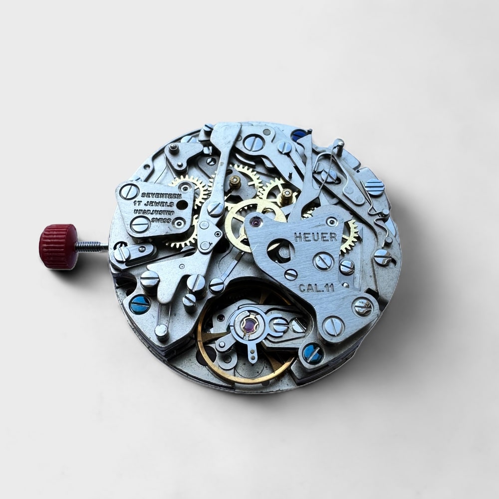 This is a picture of the BUREN CAL. 11 - AUTOMATIC MOVEMENT COMPLETE HEUER watch component.