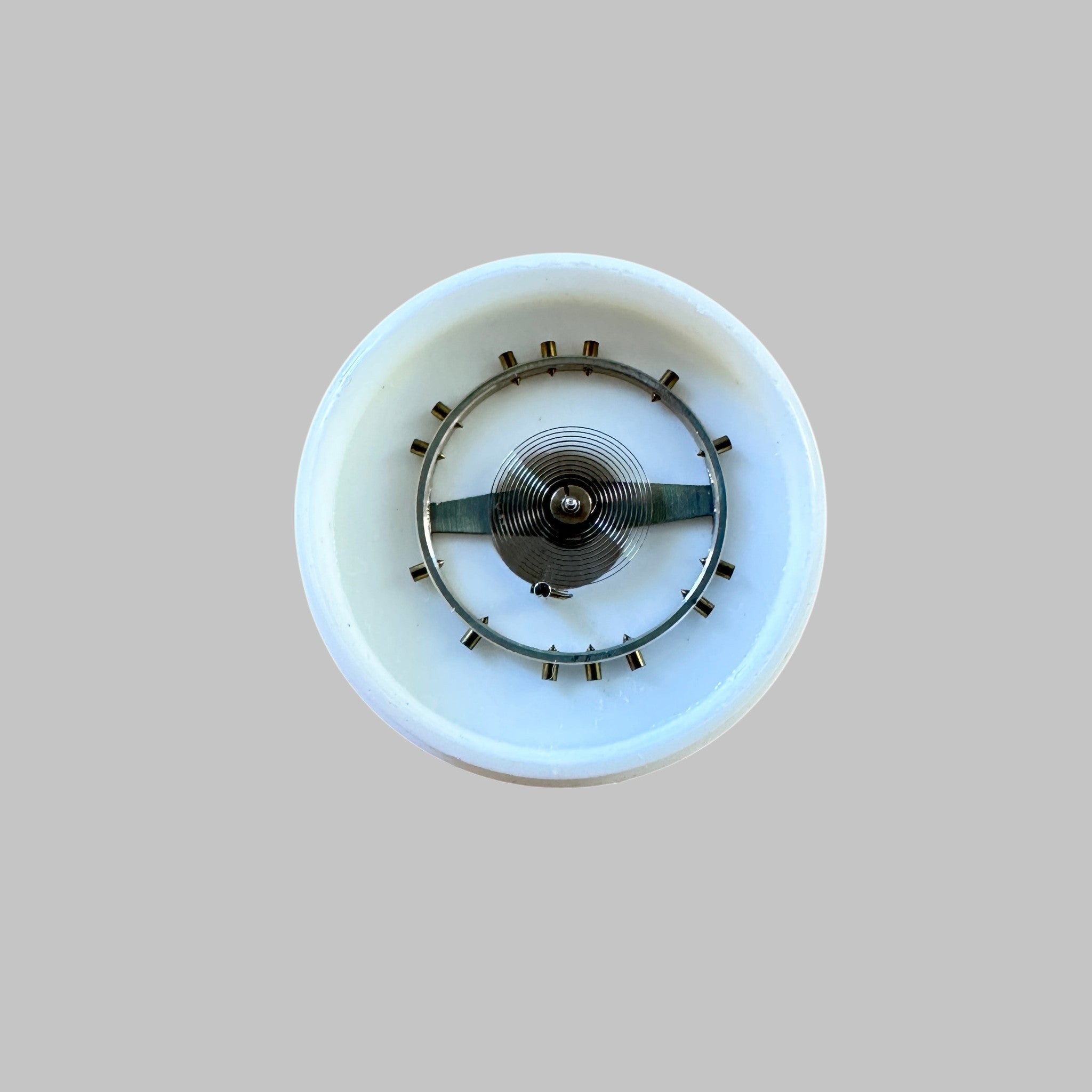 Genuine original vintage complete balance with spring from Certina for caliber 330 - side view
