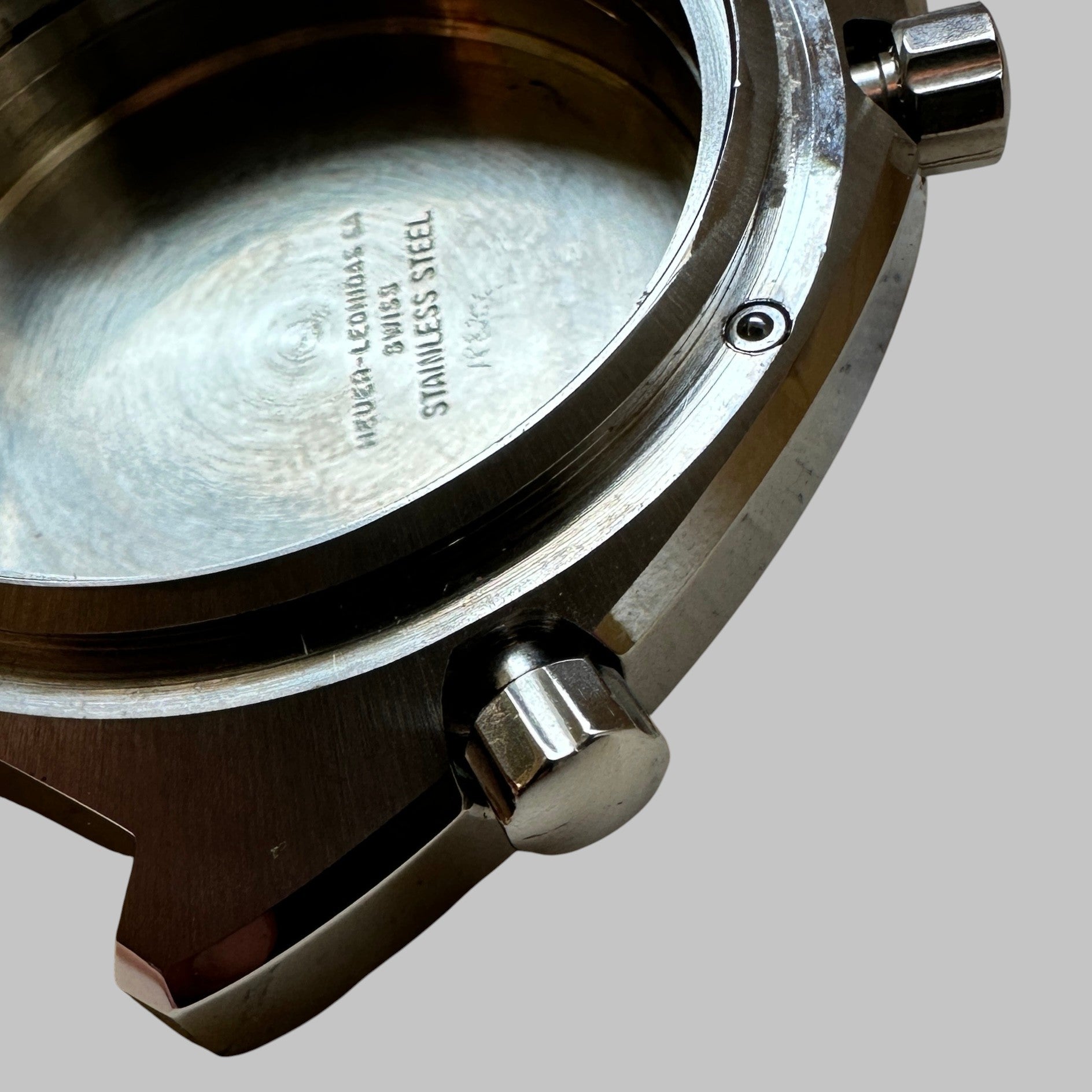 Genuine original vintage case from Heuer for caliber 11/14GMT of the model 1163GMT of line AUTAVIA - side view