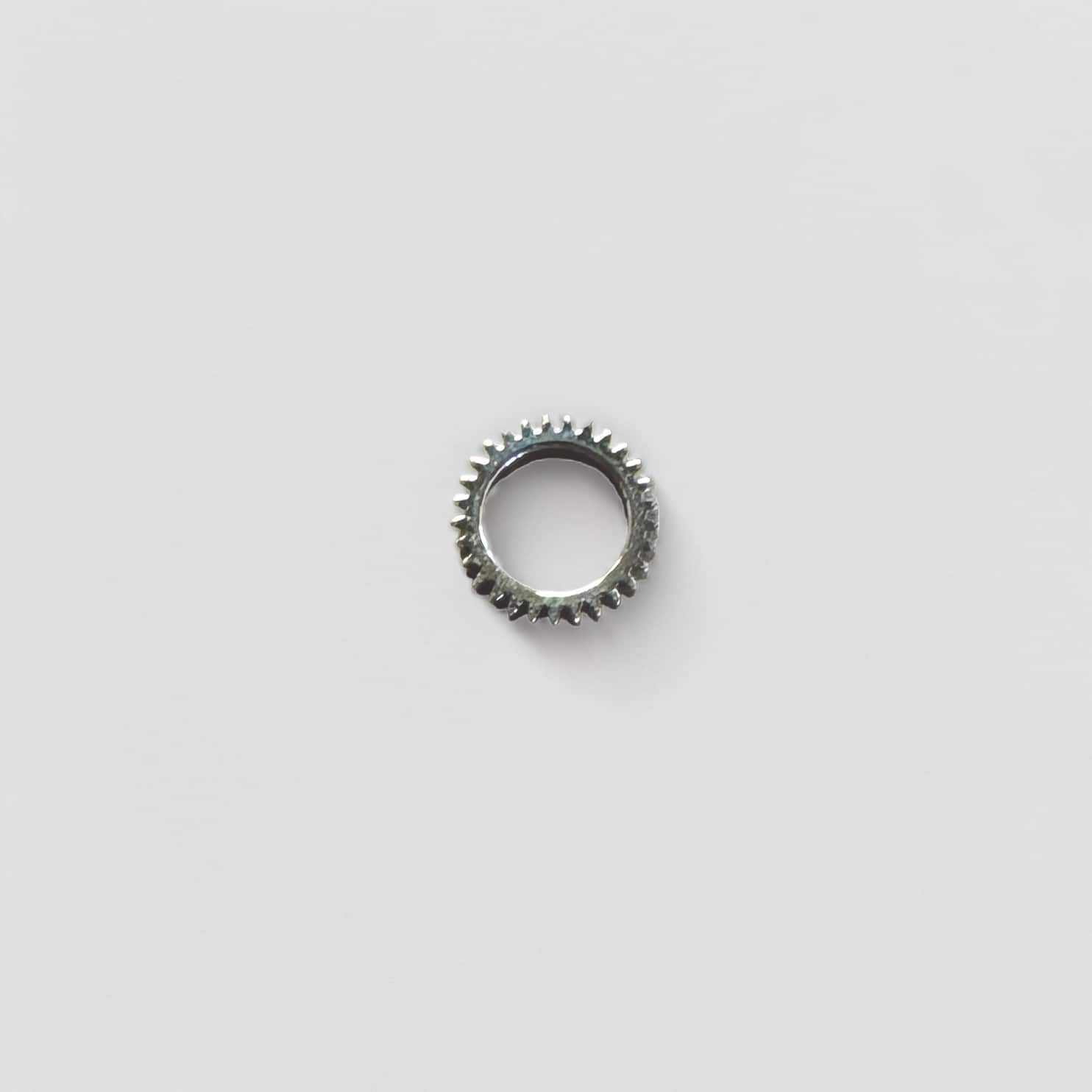 This is a picture of the LEMANIA CAL. 5100 OMEGA 1045 - ROTOR PINION 1429 watch component.