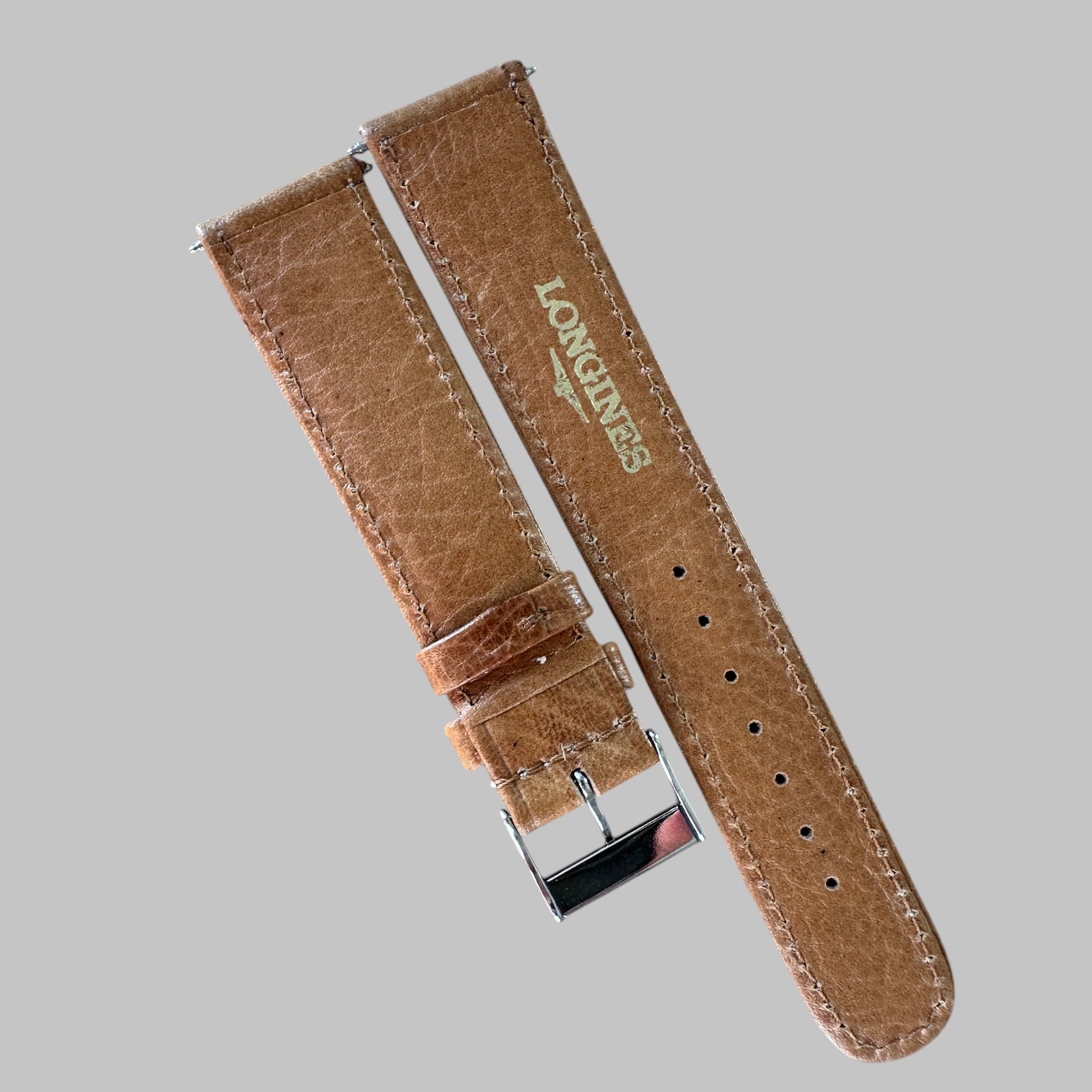 Genuine original vintage strap from Longines - side view