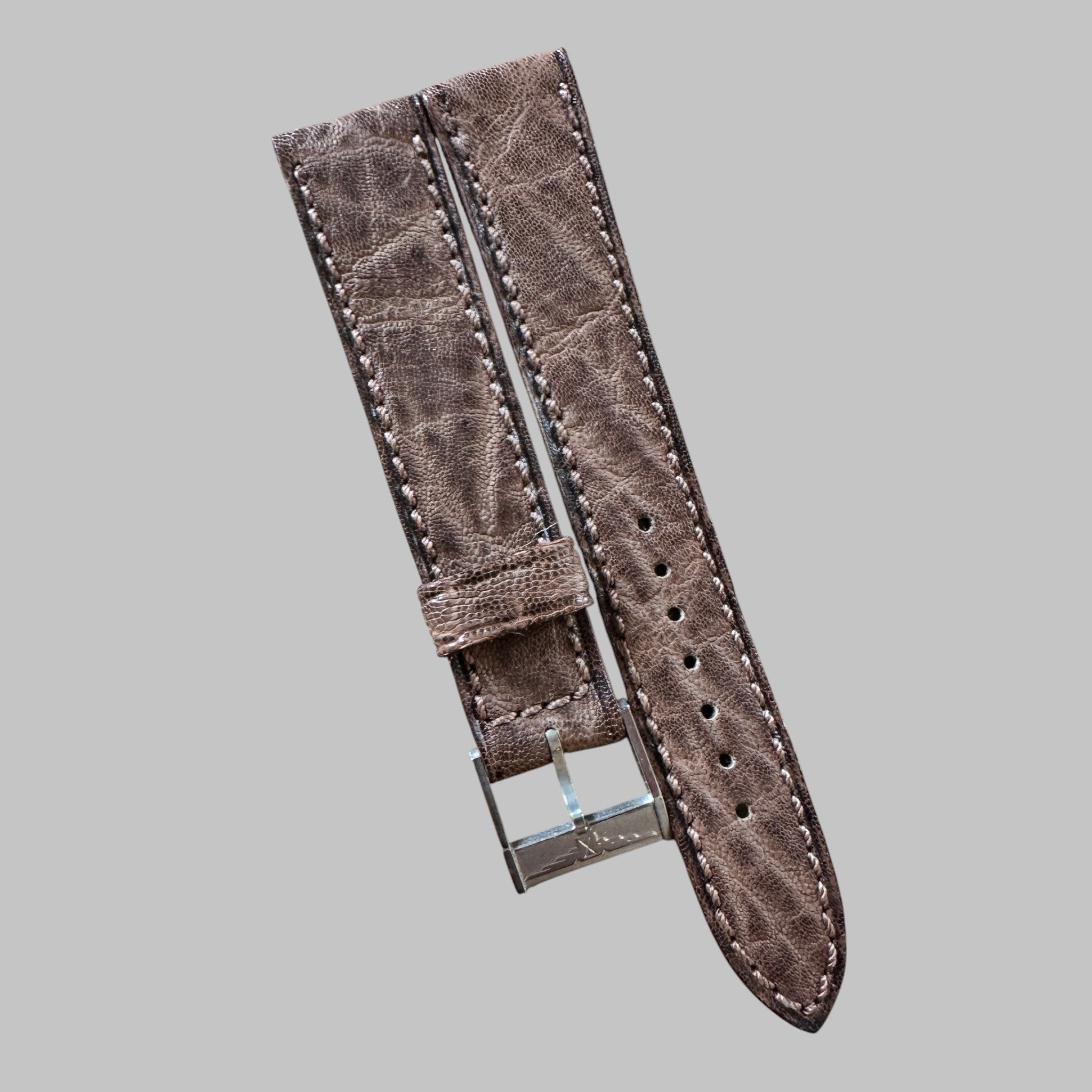 Genuine original vintage leather strap with steel buckle from Longines - side view