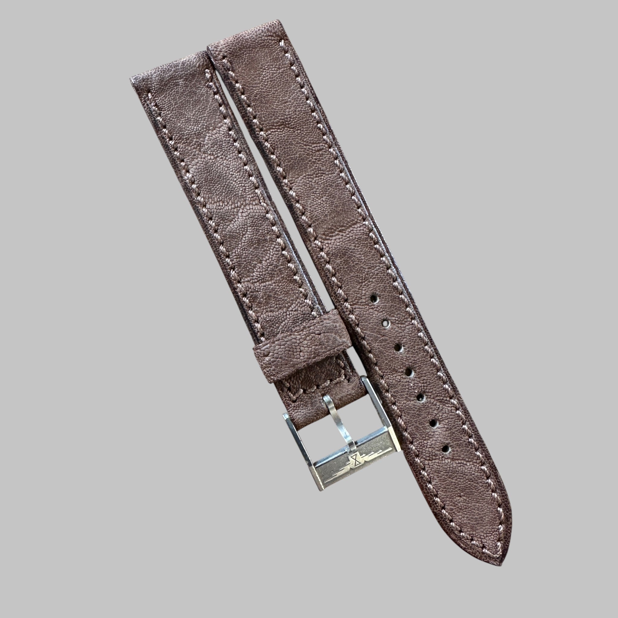 Genuine original vintage leather strap with steel buckle from Longines - side view
