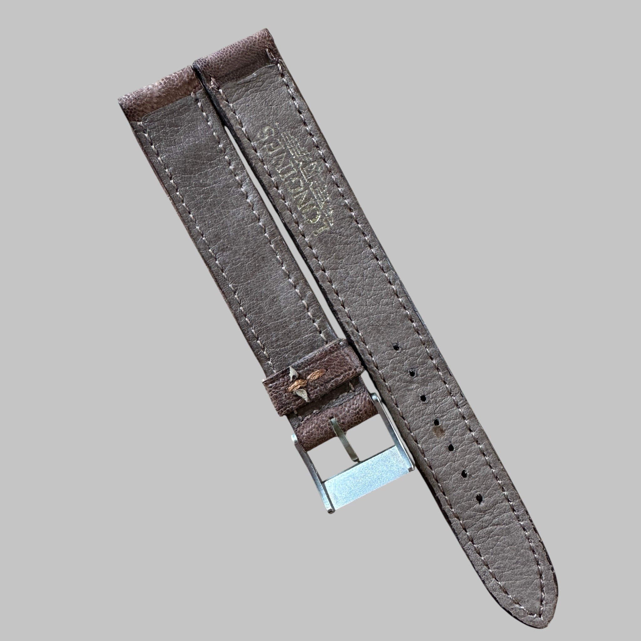Genuine original vintage leather strap with steel buckle from Longines - side view
