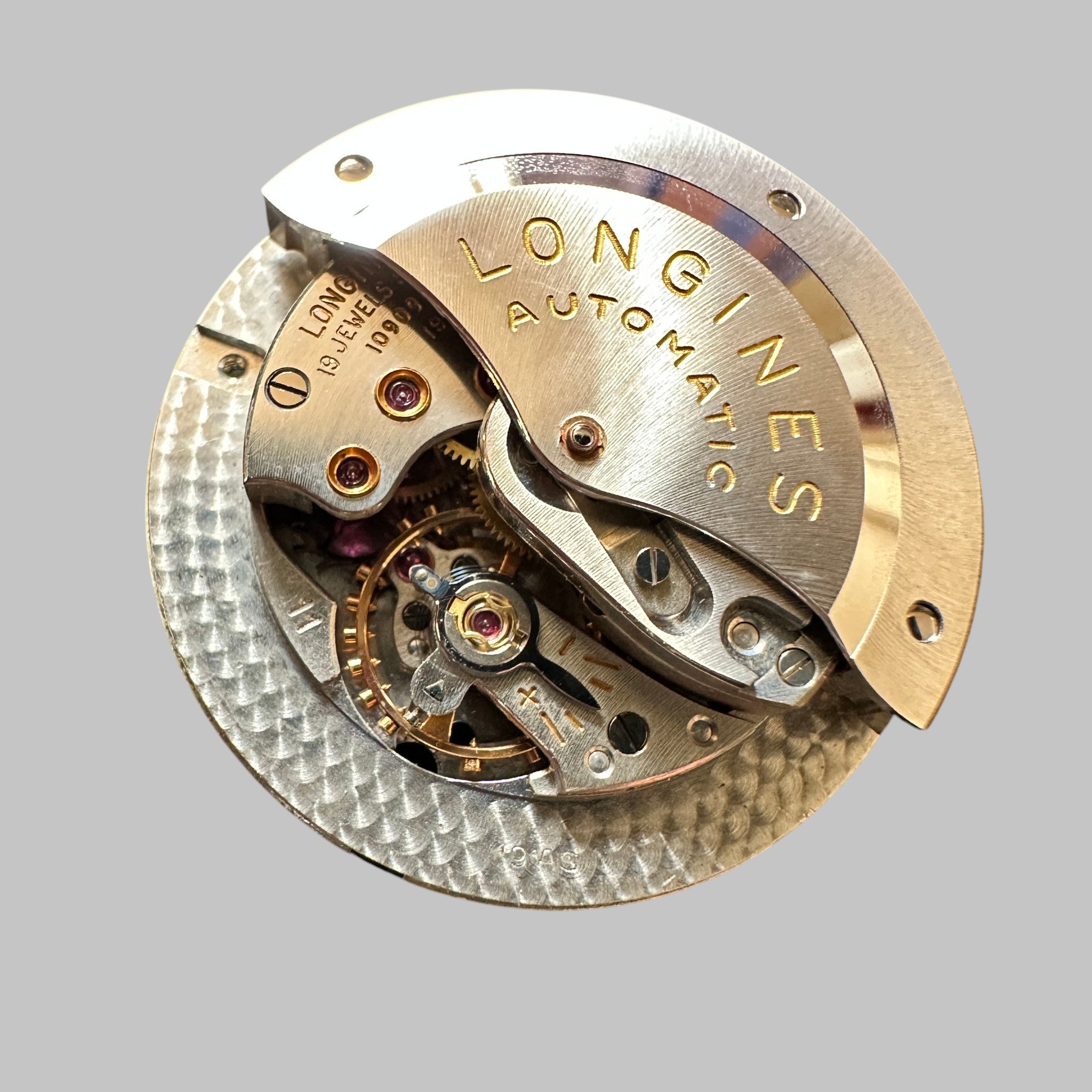 Genuine original vintage movement from Longines for caliber 19AS - side view