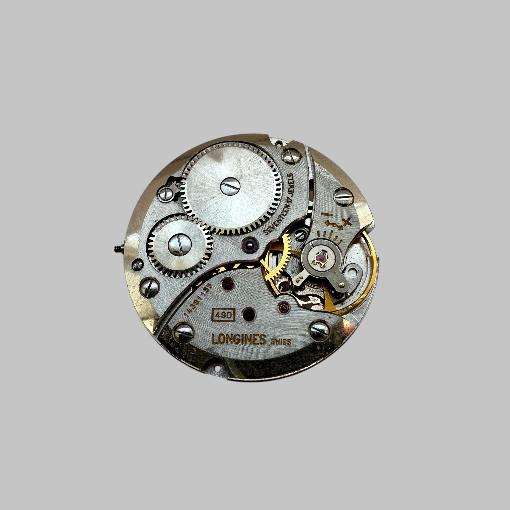 Genuine original vintage complete movement from Longines for caliber 490 - side view
