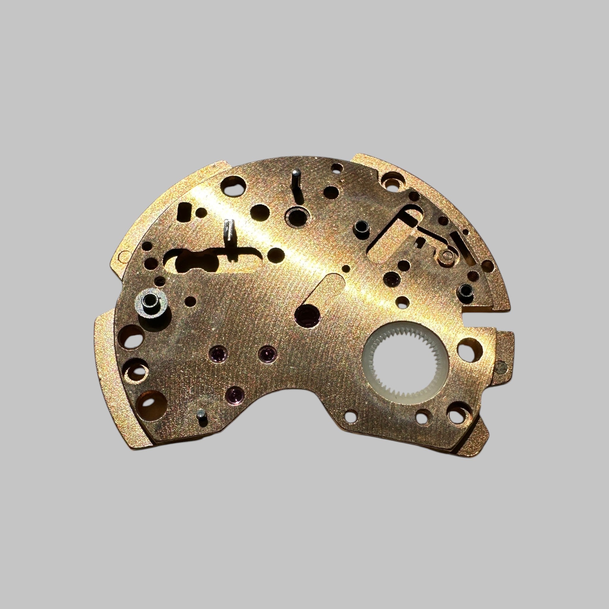 Genuine original vintage barrel and train wheel bridge from Omega for caliber 1040 referenced with nomenclature 1002 - side view