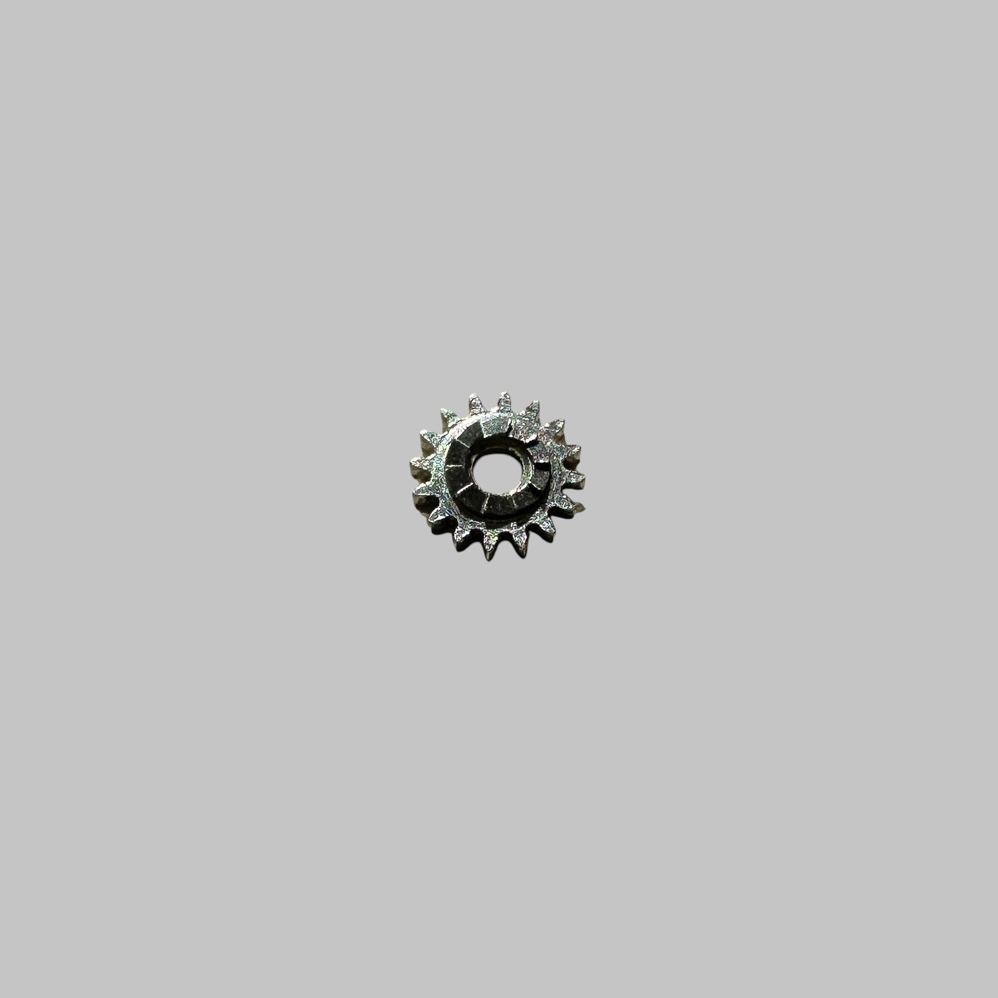 Genuine original vintage winding pinion from Omega for caliber 1040 referenced with nomenclature 1108 - side view