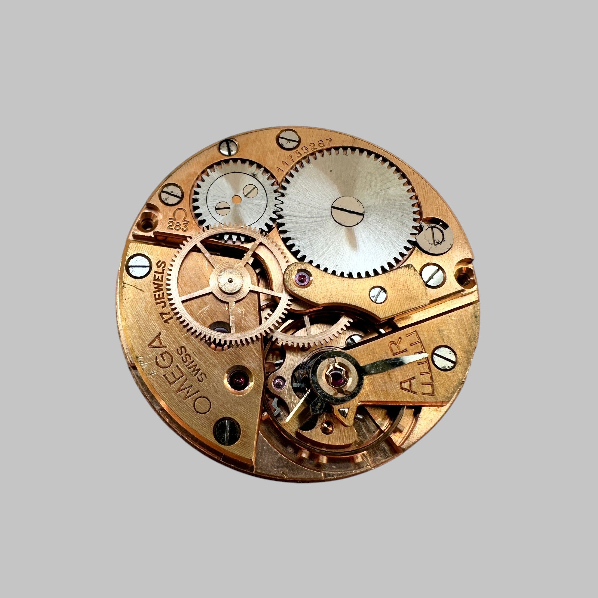 Genuine original vintage complete movement from Omega for caliber 283 - side view