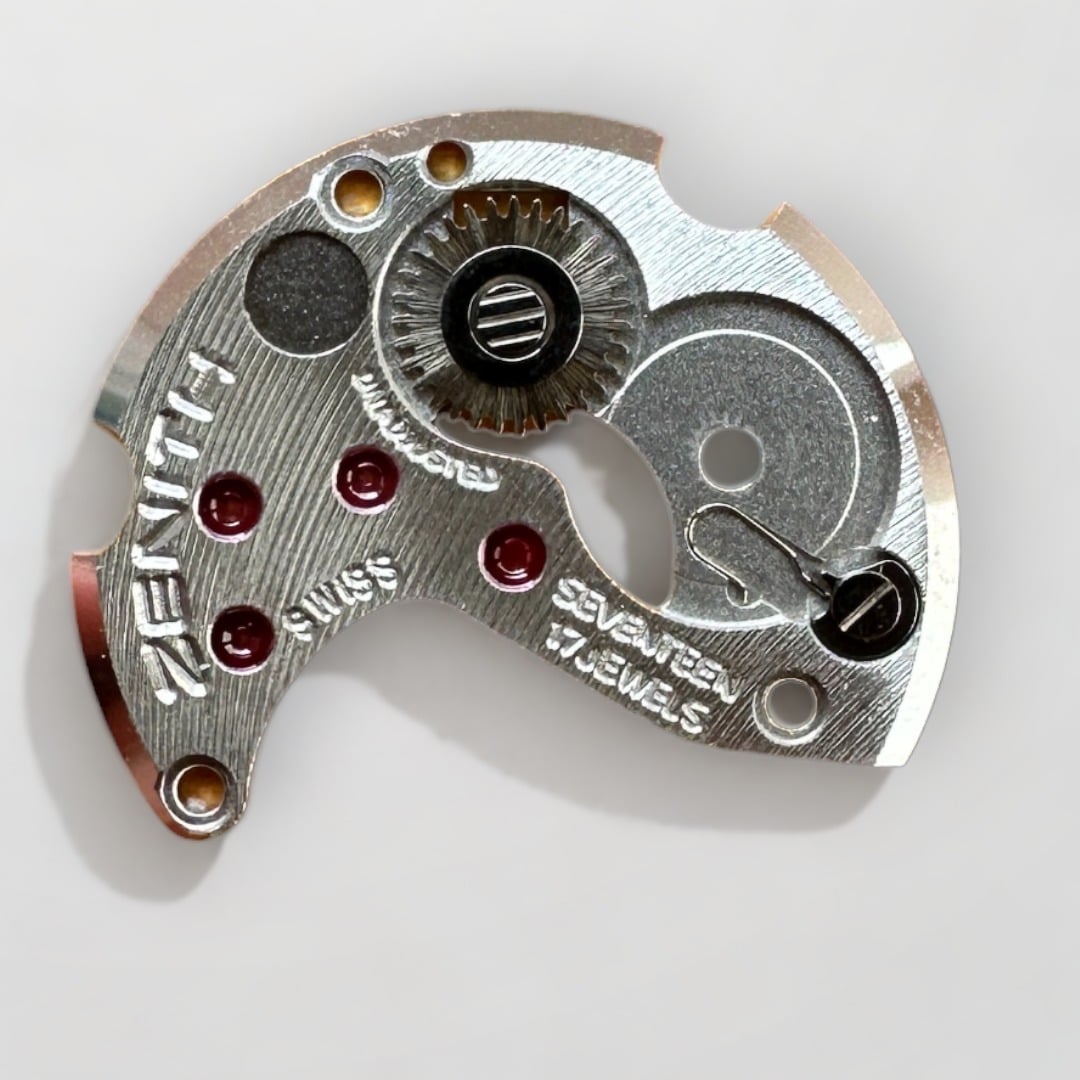 This is a picture of the ZENITH CAL. 30.5 - BARREL AND TRAIN WHEEL BRIDGE 106 watch component.